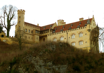 Fototapeta na wymiar The Fairytale Like Hohenschwangau Castle at the Hilltop of fall foliage in Bavaria, Germany