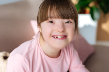 Portrait of happy child with down syndrome