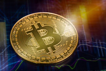 Macro shiny bitcoin and trading market data chart. virtual cryptocurrency concept 