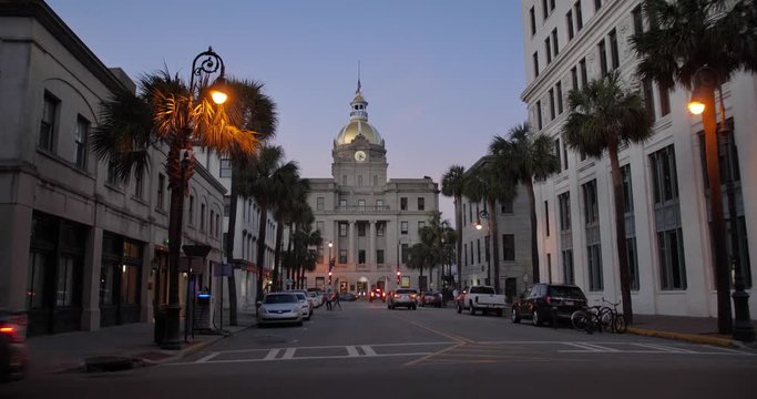 SAVANNAH, GA - Circa February, 2018 - A dusk exterior (DX) establishing shot of the Savannah city hall building.  