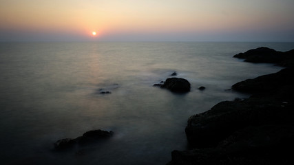Fototapeta na wymiar Dramatic sunset on the Arabian Sea.