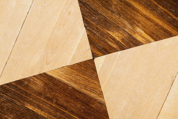 Old wooden parquet with geometric pattern