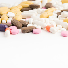 Obraz na płótnie Canvas Different colorful tablets, pharmacy concept with copy space