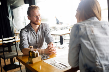 Couple dating in restaurant