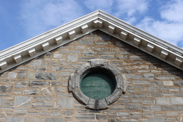 Fototapeta na wymiar Rooftop of old stone building