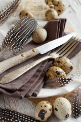 Easter table setting with quail eggs