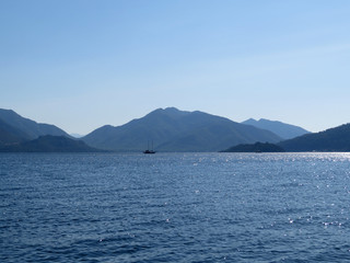 Sunrise over the mountains sea shore. Seascape at morning