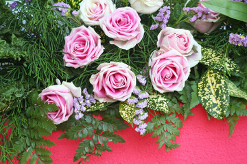 Bouquet of pink rose flowers on background