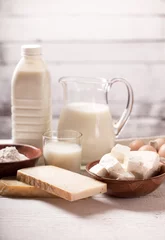 Poster Dairy products Milk and dairy products on wooden table