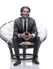 businessman sitting in a comfortable big chair