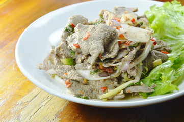 spicy slice boiled pork liver salad with herb on dish