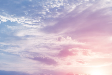 sun and cloud background with a pastel colored


