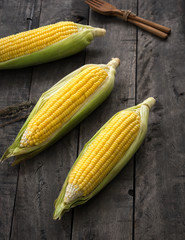 raw corn on wood


