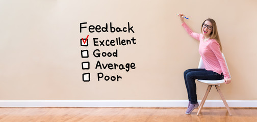 Feedback with young woman holding a pen in a chair