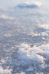 Snow on the frozen river, winter time