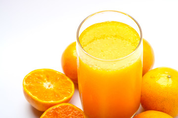 Fresh orange juice on white background