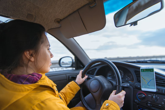 Woman Drive Car In Cold Winter Weather