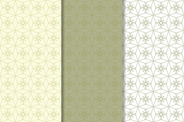Olive green and white geometric ornaments. Set of seamless patterns