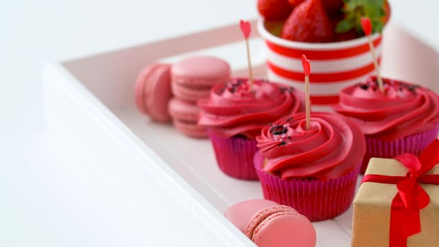 red sweets and champagne in st valentines day