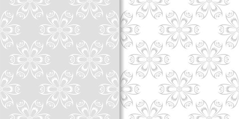 Fototapeta premium Light gray floral ornaments. Set of seamless patterns