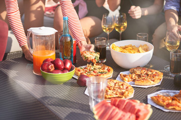 Close up of served party table with pizza