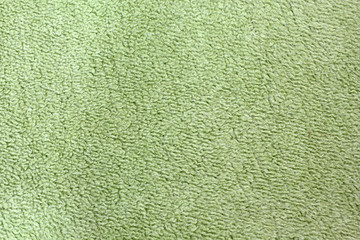 Background of wool. The cloth. Texture. Green