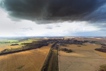Dark clouds over land , Tukums area, Latvia.