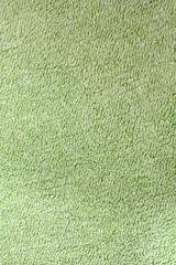 Background of wool. The cloth. Texture. Green