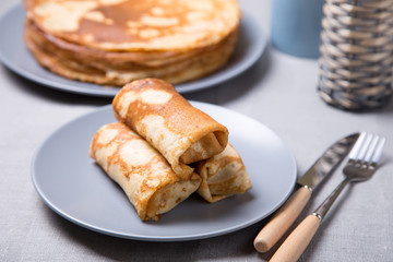 Traditional Russian pancakes with meat. Shrovetide. Maslenitsa week. Selective focus, close-up.