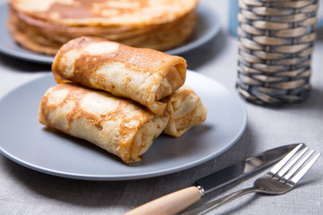 Traditional Russian pancakes with meat. Shrovetide. Maslenitsa week. Selective focus, close-up.