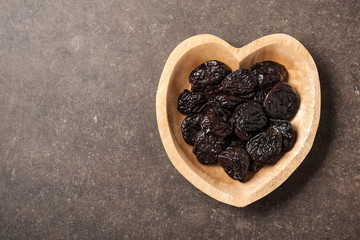 Prunes in heart shaped bowl