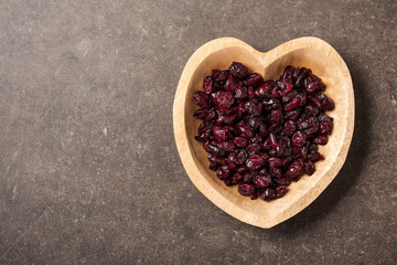 Dried cranberries in heart shaped bowl