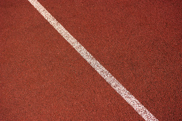 Red running track in stadium. Part of red running track
