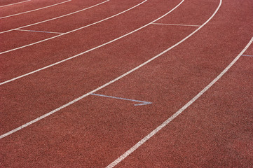 Red running track in stadium. Part of red running track
