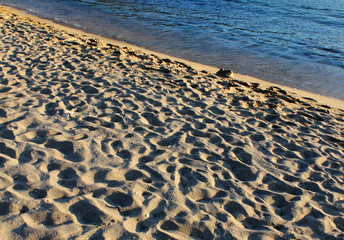 Footprints in the sand, Sifnos island, Cyclades, Greece