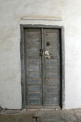 Obraz na płótnie Canvas Old door in Kastro traditional village, Sifnos island, Greece.