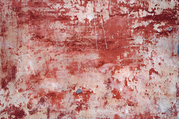 The texture of the old concrete wall is red and white.