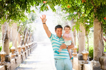 Naklejka premium 3009780 Father with a daughter in Alfabia gardens in Mallorca
