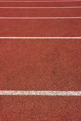 Red running track in stadium. Part of red running track
