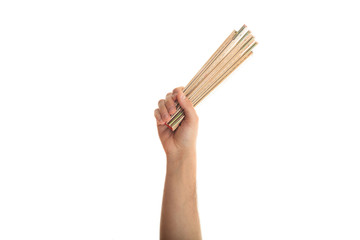 Hand holding a wooden meter on white background