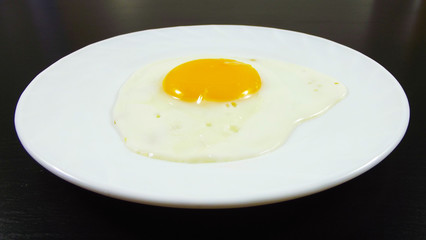 Delicious egg on a black background.