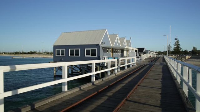 famous rail track at twilight on the longest wooden pier in the world. Busselton jetty in Busselton, Western Australia, is an iconic place and popular touristic attraction near Perth.