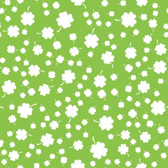 Seamless pattern from the clover leaves. Background to the day of St. Patrick. Vector illustration