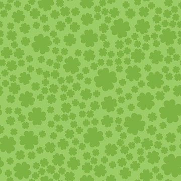 Seamless pattern from the clover leaves. Background to the day of St. Patrick. Vector illustration