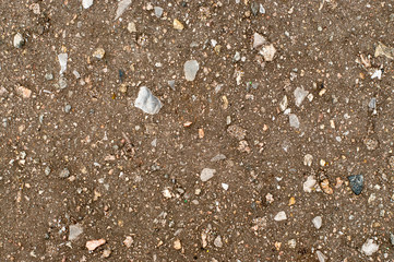 ground under asphalt with stones