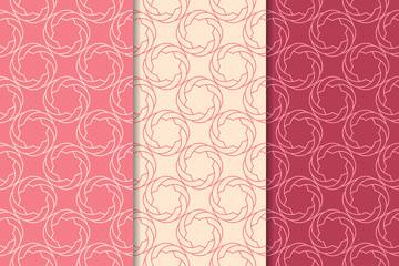 Cherry red geometric ornaments. Set of seamless patterns