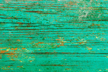 Fototapeta na wymiar old boards painted green paint