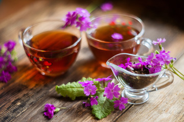 Fototapeta na wymiar glass of tea brewed with therapeutic Linden