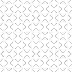 Gray geometric design on white background. Seamless pattern