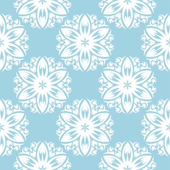 White floral seamless pattern on blue background